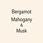 Text reading 'Bergamot Mahogany & Musk' in black lettering on a plain warm cream background.