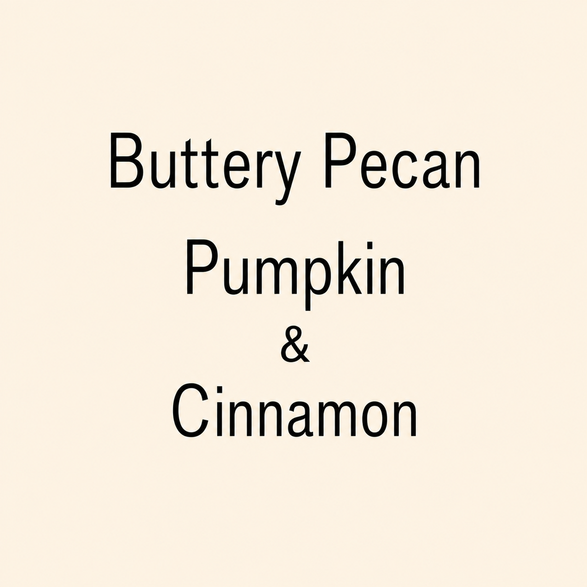 Text reading 'Buttery Pecan, Pumpkin & Cinnamon' in black lettering on a plain warm cream background.
